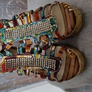 Mudd wedge sandals size 71/2 wedge heel 4inches. True to size multi color